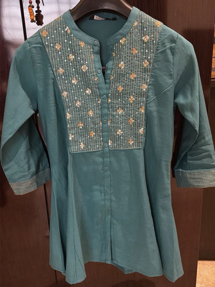 Beautiful sea green sequins short kurta