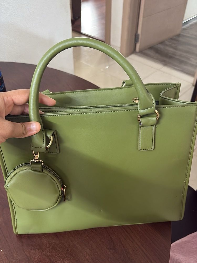 Stylish Green Tote Bag with Coin Pouch. It also ha