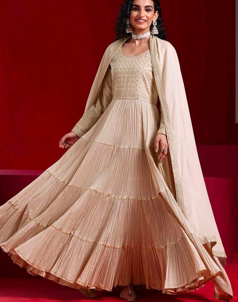 Elegant Tiered Gown with Cape