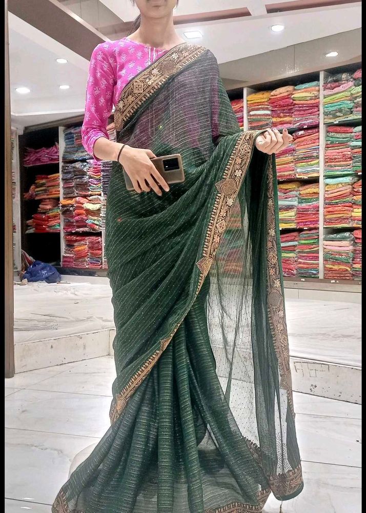 Elegant Green Saree with Golden Border