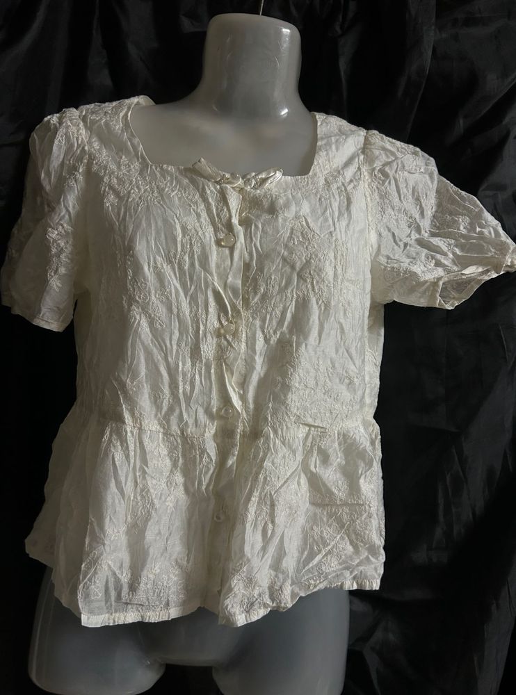 Embroidered White Peplum Blouse
