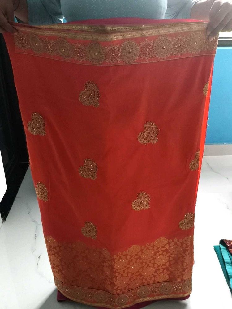Elegant Orange Embroidered Saree , stiched blouse