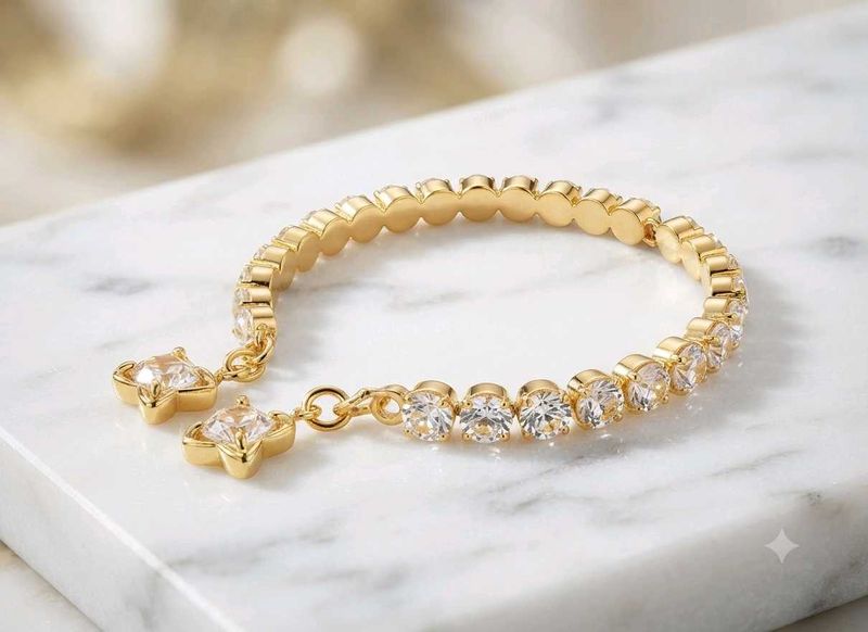 Sparkling Gold Bracelet with Charms