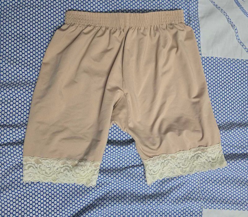 Nude color laced shorts