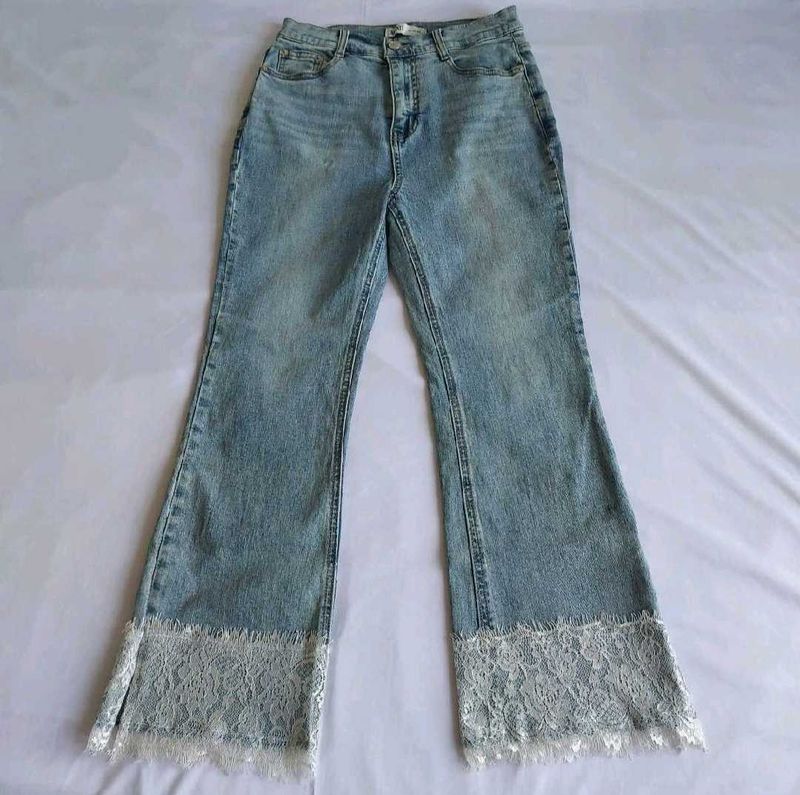 Light Wash Flare Jeans with Lace Trim