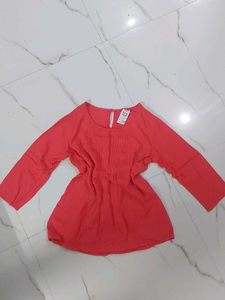 Coral Pleated Empire Waist Top