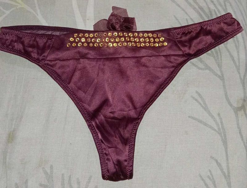 Elegant Thong with Sequins and Bow Detail