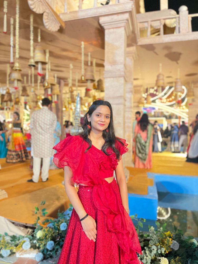 Red Lehenga with ruffle organza blouse