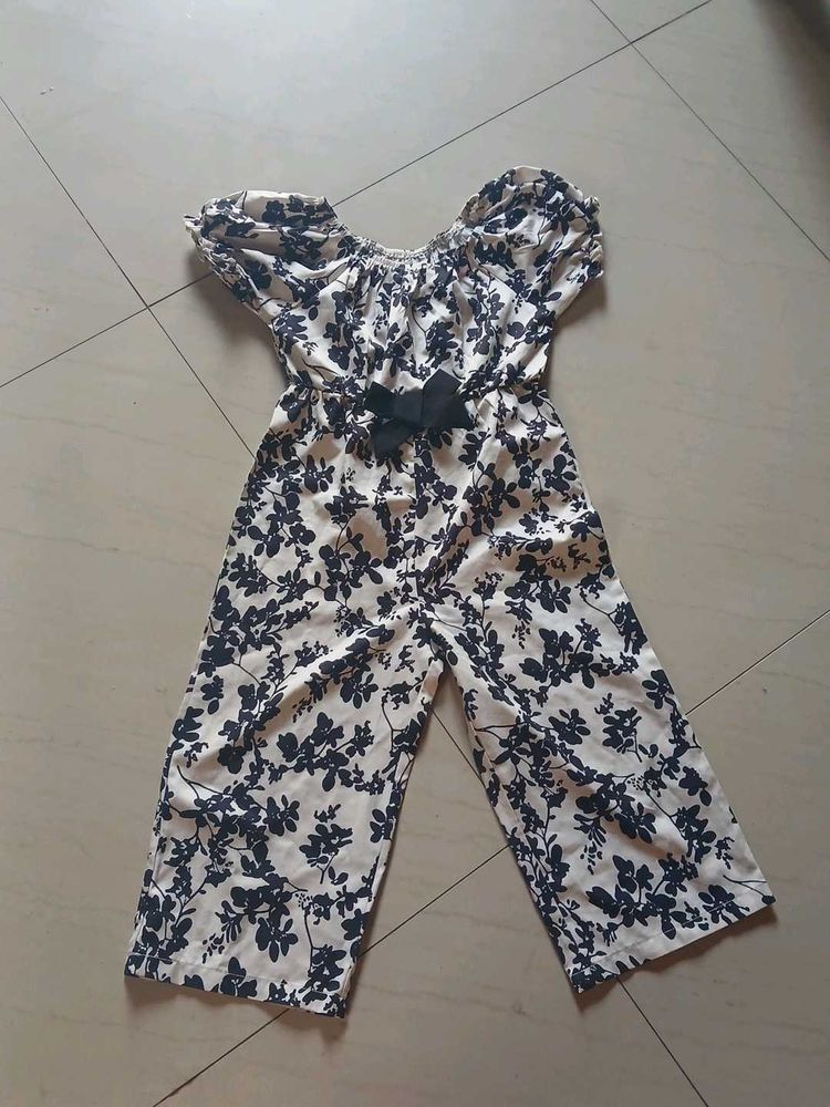 Chic Floral Jumpsuit with Bow Detail
