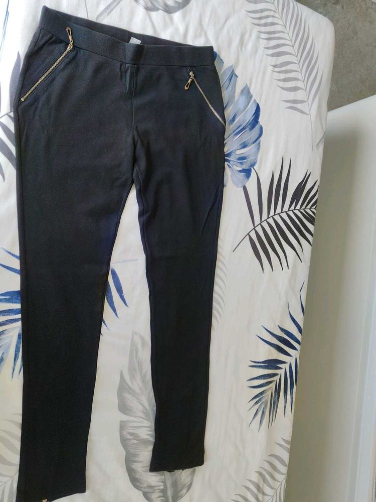 Chic Black Pants with Gold Zippers