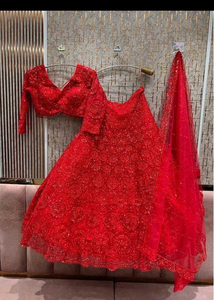 Stunning Red Embellished Lehenga Choli