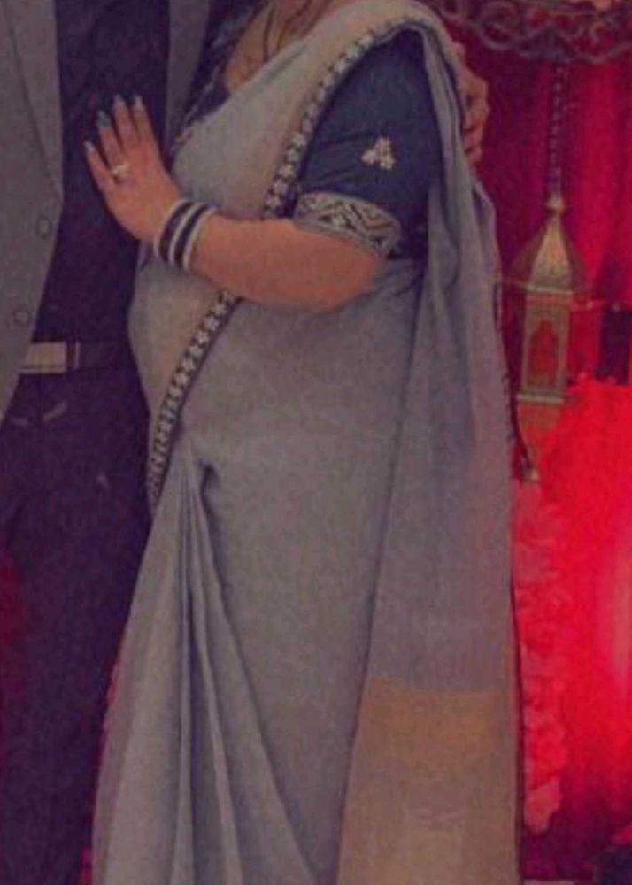 Elegant Grey Saree with Embellished stitched Blous