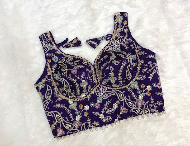 Designer Sleeveless Embroidered Blouse