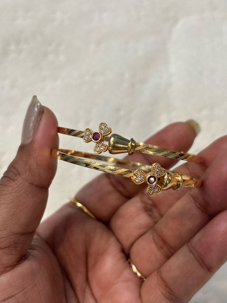 Elegant Gold Bangles with Stone Embellishments