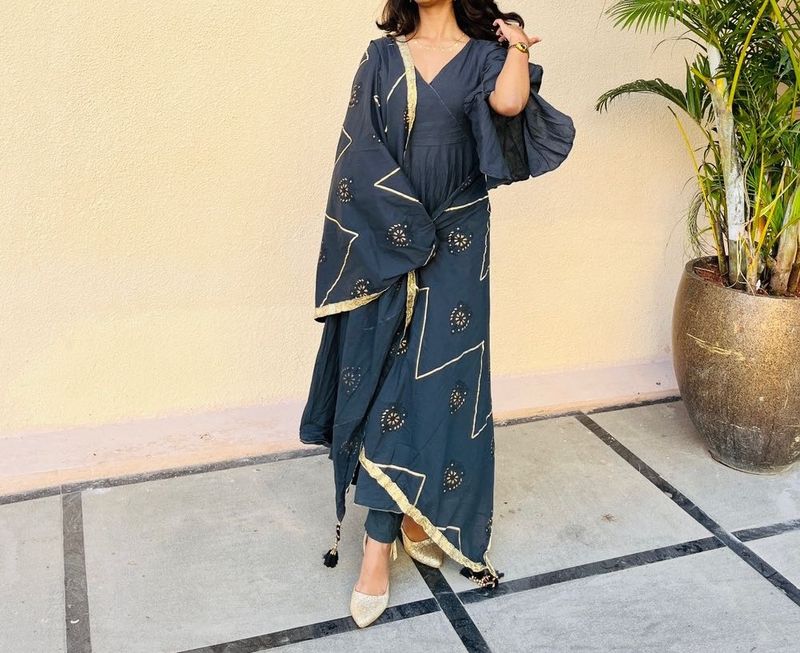 Its a beautiful anarkali type bell sleeve article