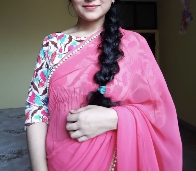 Elegant Pink Saree with Pearl Detailing