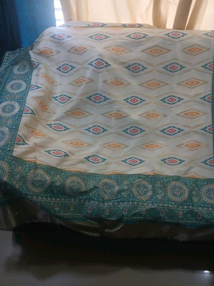 Elegant Saree with Intricate Border