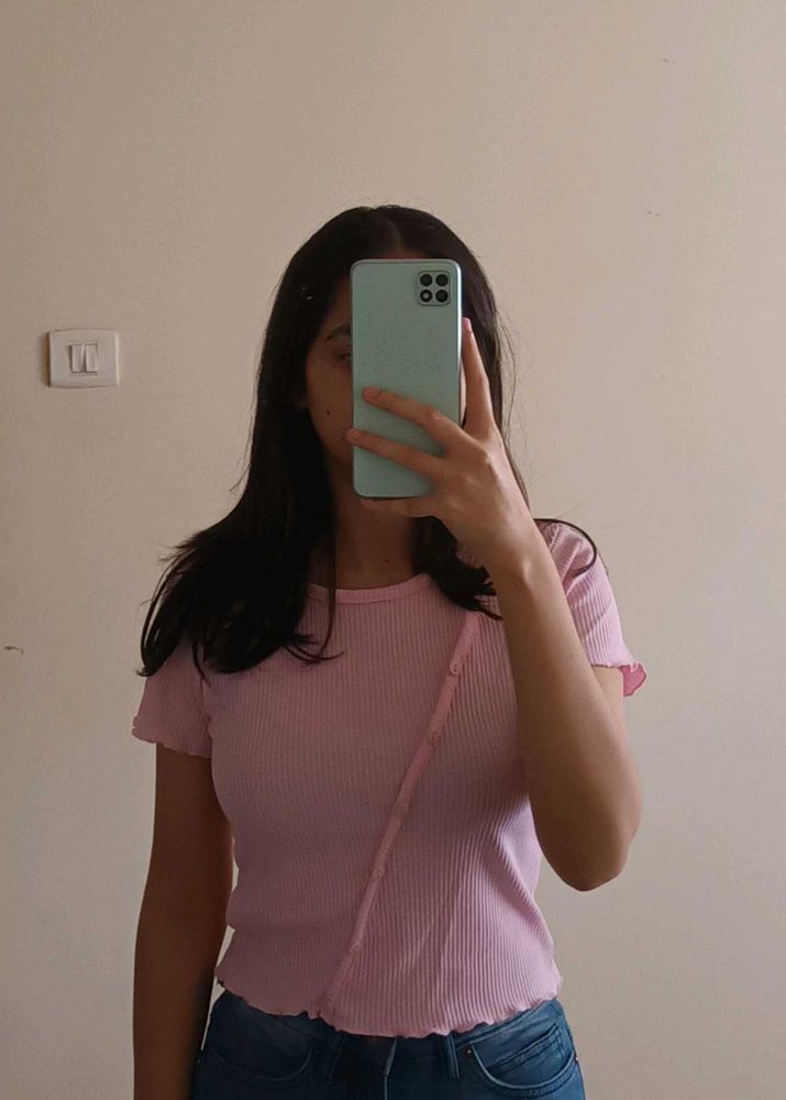 pink ribbed button-up crop top
