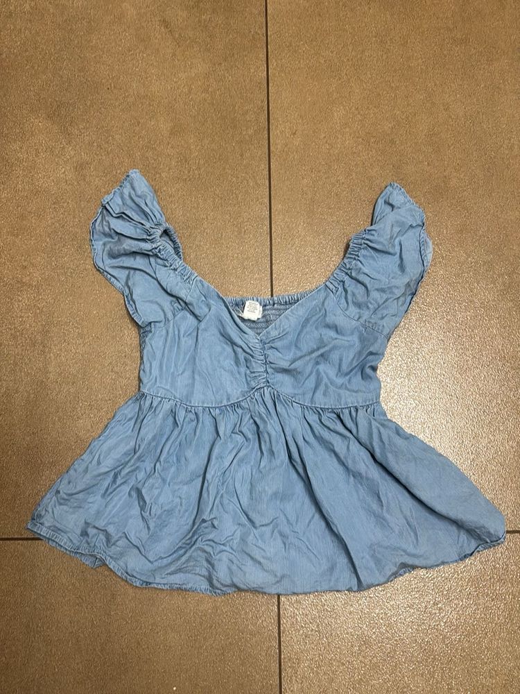Light Blue Ruffled Peplum Top