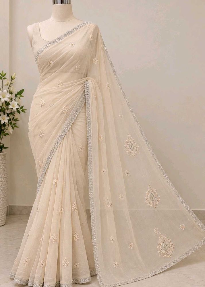 Elegant Cream Embroidered Saree