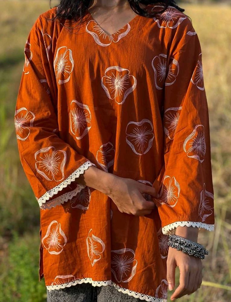 rust-orange floral printed short kurti