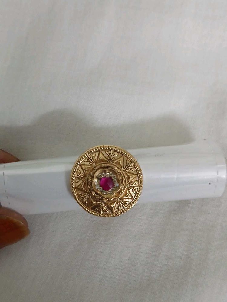 Elegant Gold Ring with Ruby Accent