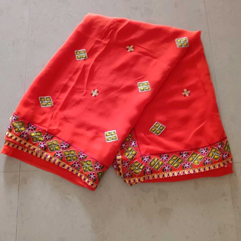 Vibrant Orange Embroidered Saree