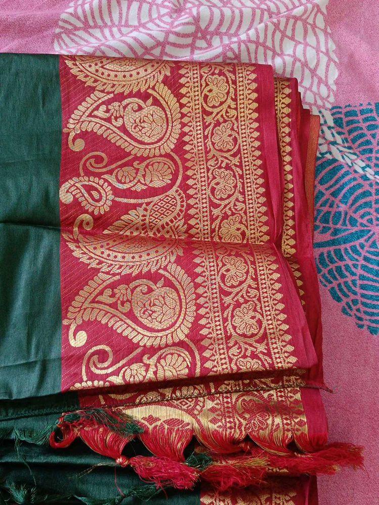 Elegant Green Saree with Gold Border