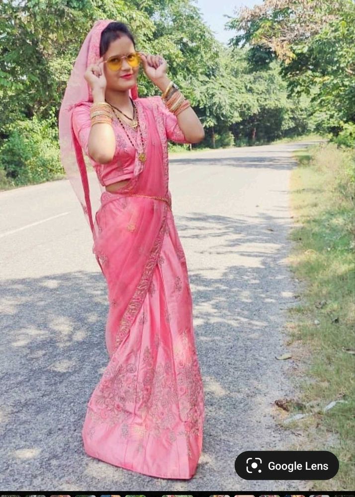 Elegant Pink Saree with Intricate Embroidery