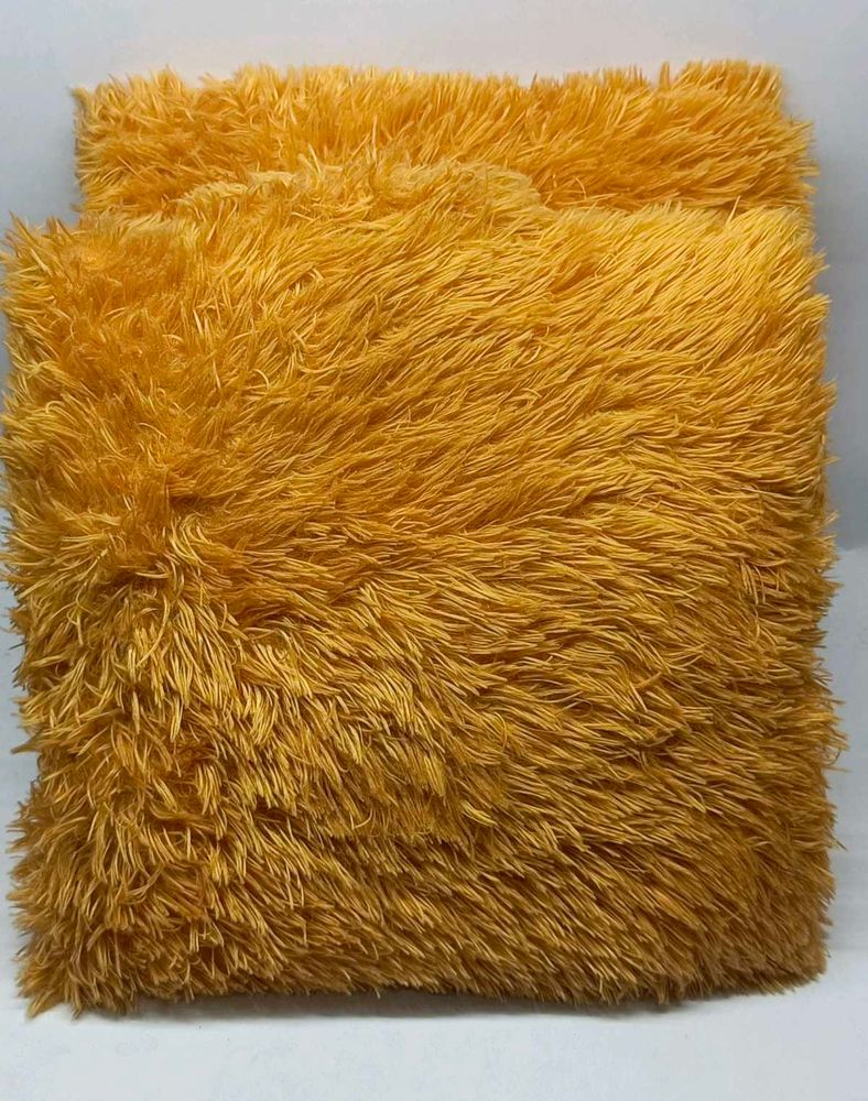 2 Golden fur Cushions