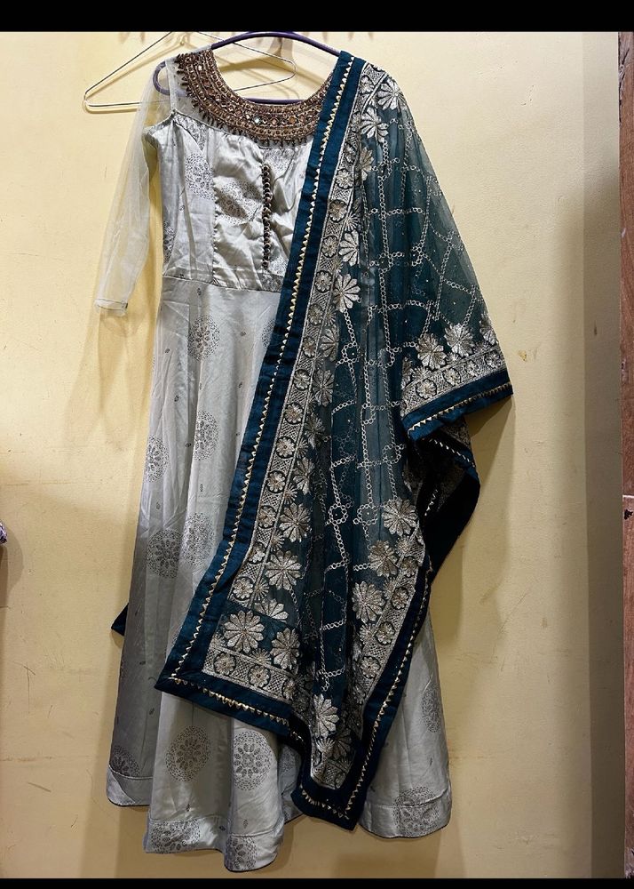 Elegant PistaGreen Anarkali with Embellished Neck