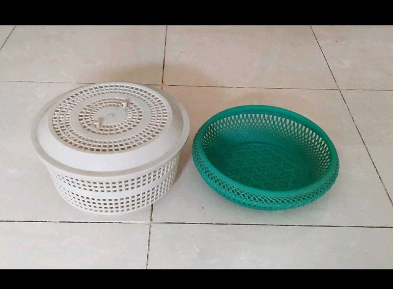 Two Plastic Storage Baskets