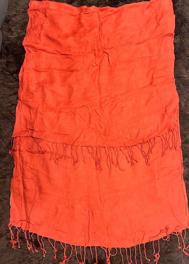 Vibrant red scarf with Tassels