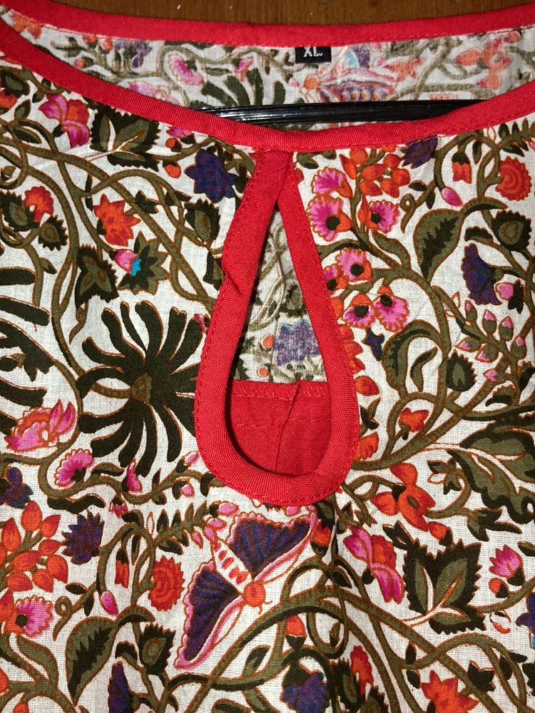 Red Kurti With Flowers Print And Designer Neck