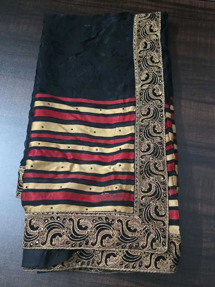 Elegant Black Saree with Red &amp; Gold Stripes