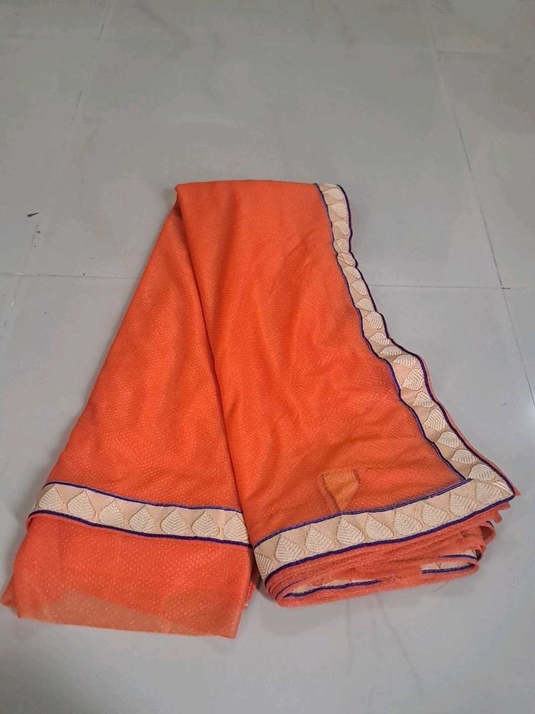 Vibrant Orange Saree with Embellished Border