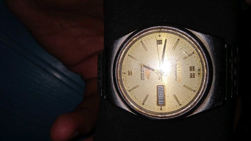 Citizen eagle 7 gold tone watch.