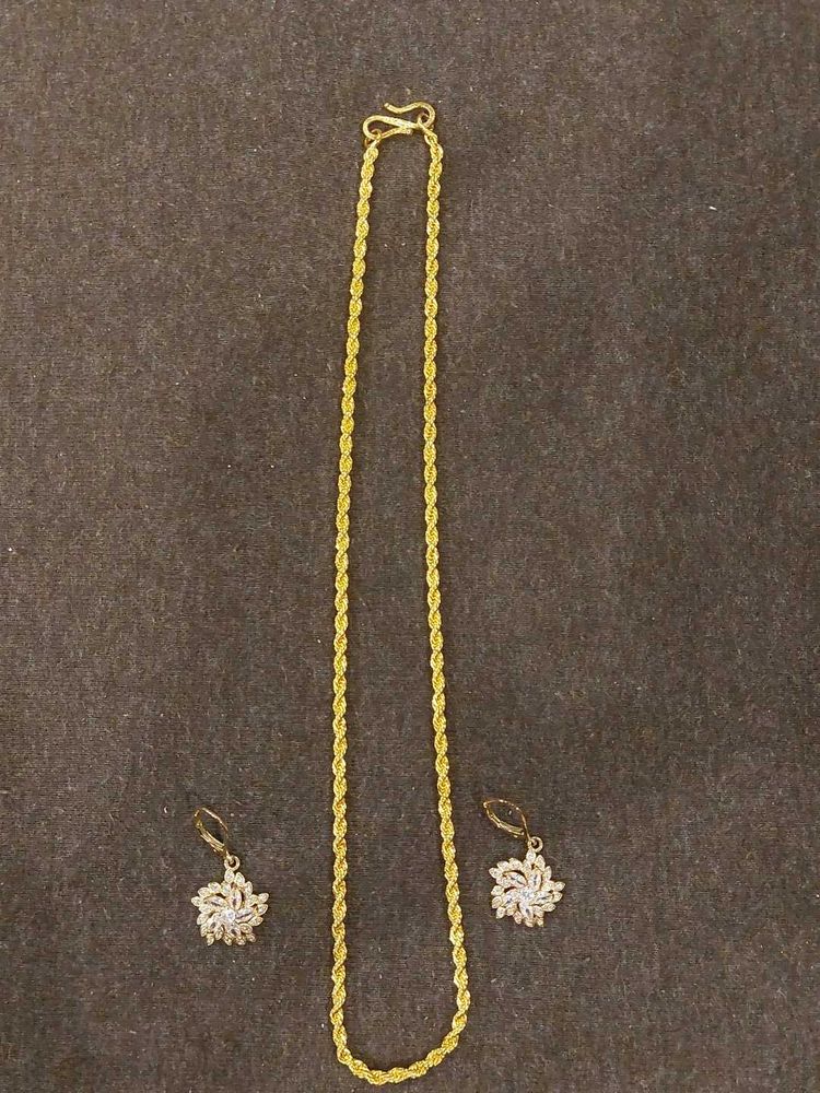 Golden Necklace and Pair of Earrings