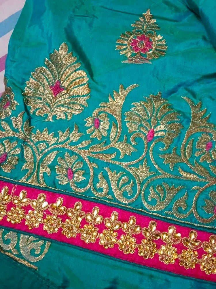 Teal Embroidered Silk Saree