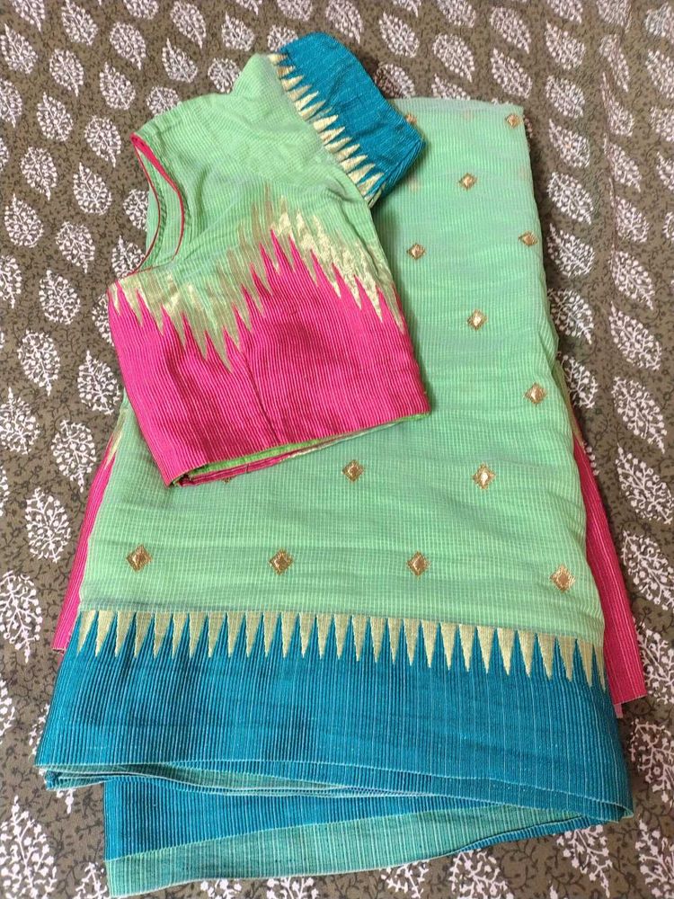 Light Green Saree with Pink &amp; Blue Blouse