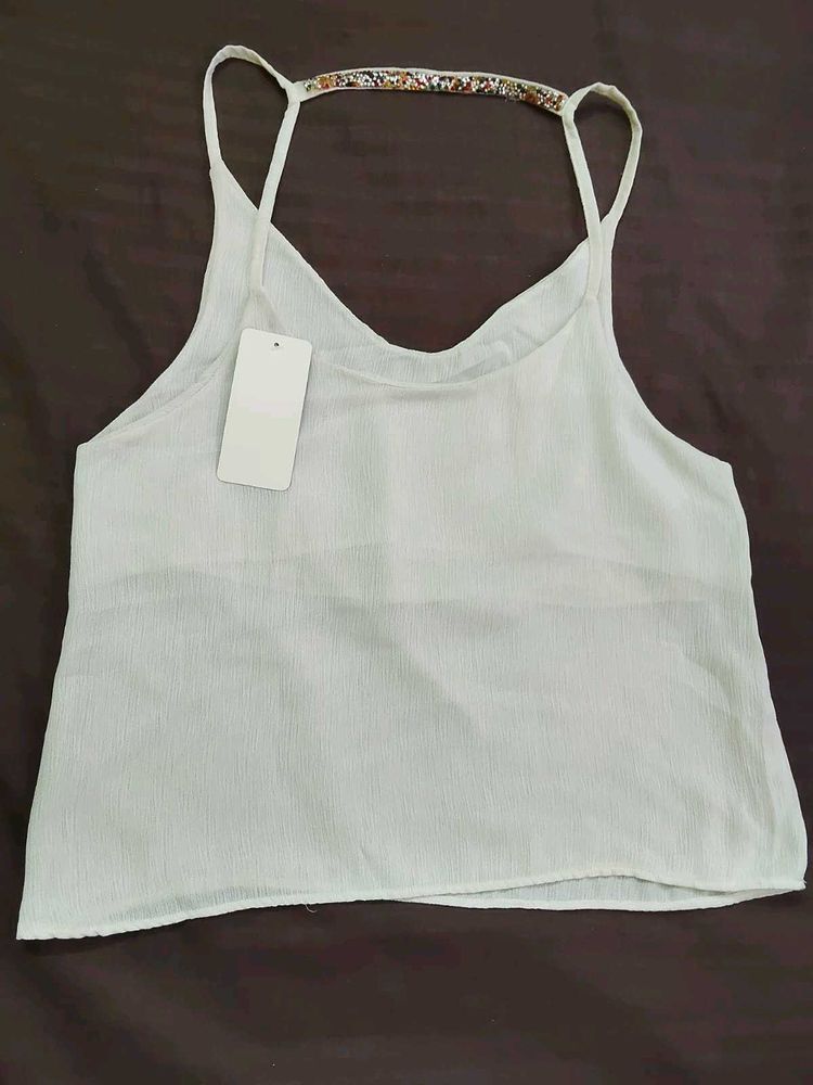 White camisole with beaded detail