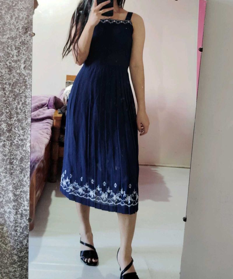 Navy Dress with Embroidery details.