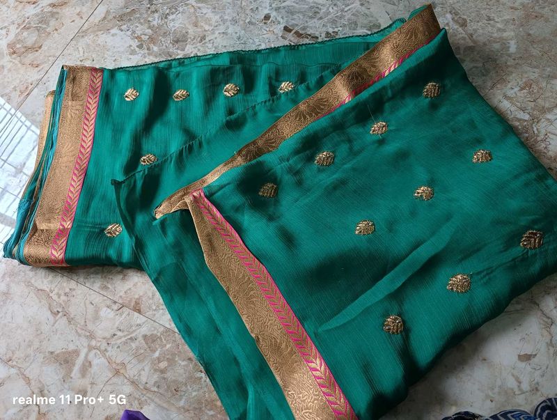 Elegant Teal Saree with Gold Embroidery