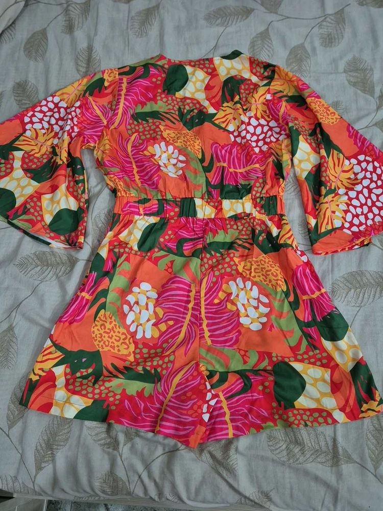 Vibrant Floral Wrap Romper
