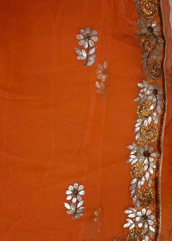 Orange Embroidered Saree.