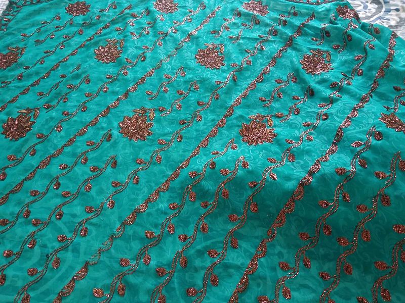 Elegant Teal Embroidered Saree