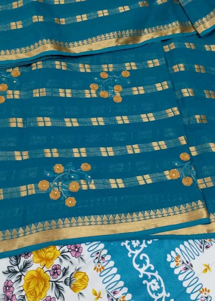 Teal Saree with Gold Border and Embellishments