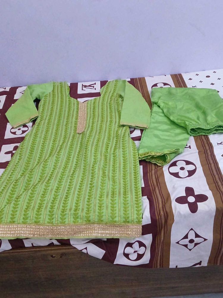 Beautiful Green Kurta Set with Gold Border