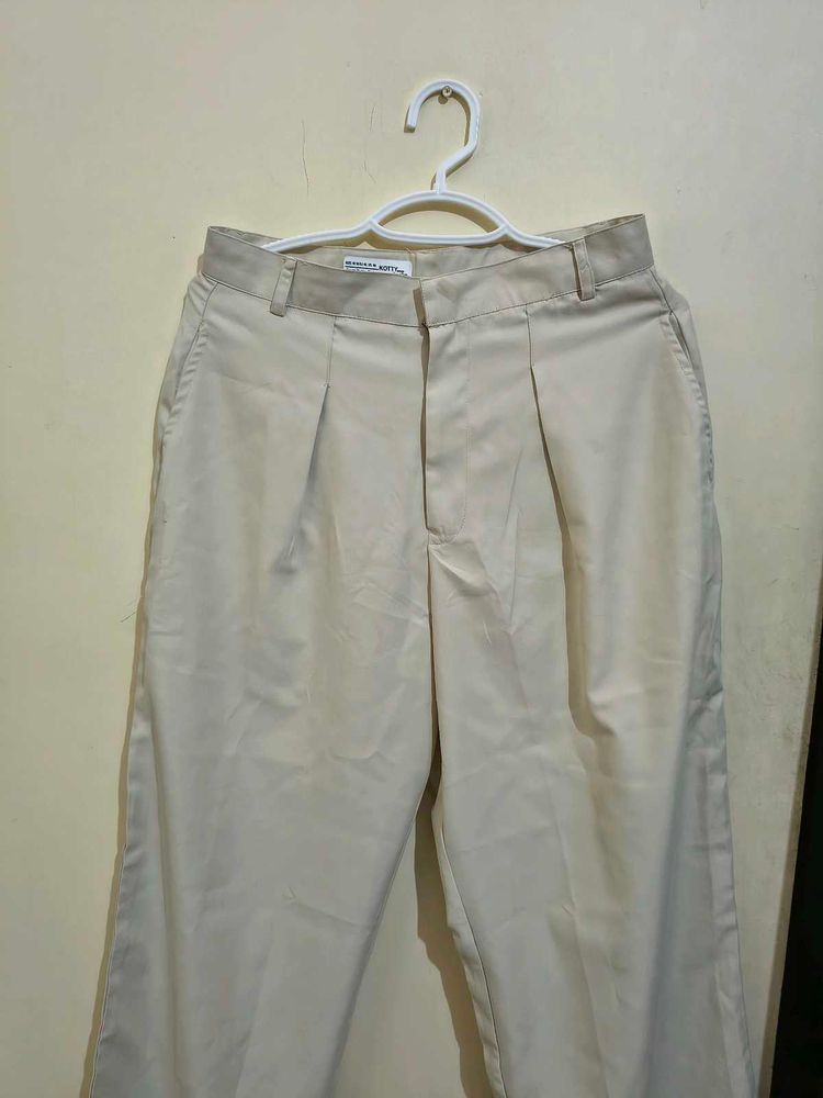 new Cream Wide-Leg Pleated Pants
