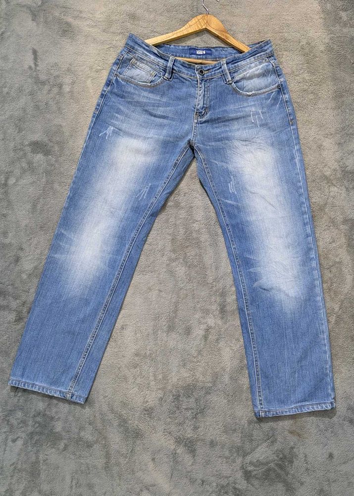 Light Wash Distressed Denim Jeans